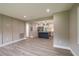 Open-concept living area showcasing hardwood flooring and modern accents at 5961 John St, Austell, GA 30106