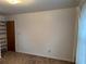 Bedroom featuring carpet flooring and a large blank wall ready for decor at 1046 Sans Souci Way, Clarkston, GA 30021