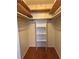 Walk-in closet with built-in shelves at 1046 Sans Souci Way, Clarkston, GA 30021