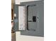 Image showing an open electrical panel with circuit breakers for managing the home's power distribution at 1046 Sans Souci Way, Clarkston, GA 30021