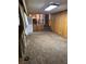 View of the spacious living room, steps, and partial view of the kitchen area at 1046 Sans Souci Way, Clarkston, GA 30021