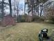 Well-maintained backyard with an outdoor shed for extra storage space at 1046 Sans Souci Way, Clarkston, GA 30021