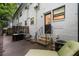 Relaxing backyard patio with seating, grill, and access to the home's lower level at 1683 Briarcliff Ne Rd # 4, Atlanta, GA 30306