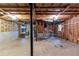 Unfinished basement showcasing exposed insulation, and visible utilities at 2047 Cliffton Ter, Snellville, GA 30039