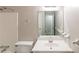 Bathroom featuring a white vanity, a large mirror, and a shower-tub combo at 2047 Cliffton Ter, Snellville, GA 30039