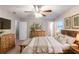 Relaxing main bedroom with wooden furniture, neutral color palette, and a comfortable bed at 2047 Cliffton Ter, Snellville, GA 30039