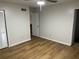 A spacious bedroom with wood-look floors and a ceiling fan at 267 Toweridge Sw Dr, Marietta, GA 30064