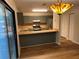 Open kitchen with green cabinetry, breakfast bar, and modern stainless steel appliances at 267 Toweridge Sw Dr, Marietta, GA 30064