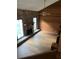 Bright living room with wood-look floors, stone fireplace, and vaulted ceilings at 267 Toweridge Sw Dr, Marietta, GA 30064