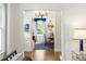 Open floor plan dining room with gold chandelier and natural light at 3415 Habersham Nw Rd, Atlanta, GA 30305