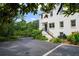 Charming two-story home with beautiful landscaping, brick stairs and gated driveway at 3415 Habersham Nw Rd, Atlanta, GA 30305