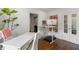 Bright office featuring a stand up desk, treadmill and built in bookcases at 3415 Habersham Nw Rd, Atlanta, GA 30305