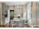 Charming kitchen dining area with a stylish chandelier and lots of natural light at 3415 Habersham Nw Rd, Atlanta, GA 30305