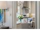 Eat-in kitchen view, with white cabinets, stainless appliances, and island seating at 3415 Habersham Nw Rd, Atlanta, GA 30305