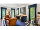 Elegant office featuring custom built ins and an oversized painting at 3415 Habersham Nw Rd, Atlanta, GA 30305