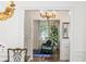 Inviting living room with chandelier, comfortable seating, and natural light at 3415 Habersham Nw Rd, Atlanta, GA 30305