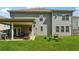 Home backyard featuring a covered patio and a well-maintained lawn at 3711 Wartrace Dr, Atlanta, GA 30331