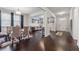 Open dining area with hardwood floors, seamlessly connecting to the living room and entryway at 3711 Wartrace Dr, Atlanta, GA 30331