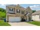 Beautiful two-story home boasts a spacious driveway and manicured front lawn at 3711 Wartrace Dr, Atlanta, GA 30331