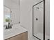 Modern bathroom with frameless shower, white subway tile, and modern vanity at 4445 Beechnut Circle, Cumming, GA 30028