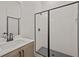 Modern bathroom with a glass-enclosed shower, sleek fixtures, and a stylish vanity at 4445 Beechnut Circle, Cumming, GA 30028