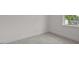 Comfortable bedroom with neutral carpet and light colored walls, showcasing neighborhood views at 4445 Beechnut Circle, Cumming, GA 30028