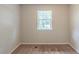 Cozy bedroom with natural light from the window and neutral carpet at 2242 Cherokee Valley Cir, Lithonia, GA 30058