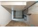 Spacious two car garage with concrete floor and cinder block accent wall at 2242 Cherokee Valley Cir, Lithonia, GA 30058