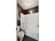 Bathroom featuring a shower-tub combination, toilet, and vanity at 573 Hambrick Sq, Stone Mountain, GA 30083