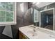 Bathroom featuring ample natural light from the window at 573 Hambrick Sq, Stone Mountain, GA 30083