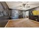 Bedroom with fan and unique wall art at 573 Hambrick Sq, Stone Mountain, GA 30083