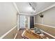Dining area with wood-look flooring, chair rail, and natural light at 573 Hambrick Sq, Stone Mountain, GA 30083