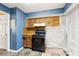 Kitchen featuring basic appliances and cabinetry, ready for customization at 573 Hambrick Sq, Stone Mountain, GA 30083