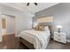 Calm bedroom space featuring natural light, neutral colors, decorative pillows and a ceiling fan at 1292 Lenox Park Ne Blvd, Brookhaven, GA 30319