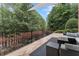 Spacious patio with outdoor seating and a view of the landscaped backyard at 1292 Lenox Park Ne Blvd, Brookhaven, GA 30319