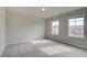 Bedroom with carpet, natural light from two windows, and neutral walls at 251 Arnewood Cir, Mcdonough, GA 30253