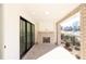 Cozy covered brick porch with a fireplace, perfect for outdoor relaxation at 362 Olmstead Way # 23, Alpharetta, GA 30022