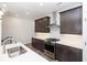 Modern kitchen features stainless steel appliances, white countertops, and stylish cabinetry at 362 Olmstead Way # 23, Alpharetta, GA 30022