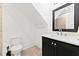 Well-lit bathroom featuring a sleek vanity, modern fixtures, and a stylish mirror at 1103 Briar Cove Ne Cir, Atlanta, GA 30329
