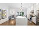 Bright, open kitchen with a large island, stainless steel appliances, and a connected dining area at 1103 Briar Cove Ne Cir, Atlanta, GA 30329