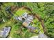 Expansive property features a pool, meticulously landscaped grounds, and a private driveway at 150 Trinity Farm Dr, Canton, GA 30115