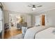 Well-lit bedroom with ensuite bathroom and a sliding barn door at 150 Trinity Farm Dr, Canton, GA 30115