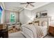 Inviting bedroom with a plush bed, seating area, and soft, neutral tones at 150 Trinity Farm Dr, Canton, GA 30115