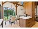 Charming dining area with natural light, modern chandelier, and seating for four at 150 Trinity Farm Dr, Canton, GA 30115