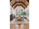 Elegant dining room with wood ceiling beams and ample natural light at 150 Trinity Farm Dr, Canton, GA 30115
