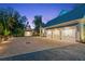 Four-car garage with a brick-paved driveway, offering ample parking and storage at 150 Trinity Farm Dr, Canton, GA 30115