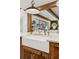 Farmhouse style kitchen island with a white countertop and a stainless steel faucet at 150 Trinity Farm Dr, Canton, GA 30115