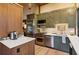 Modern kitchen with stainless steel appliances, a gas range, and custom green cabinetry at 150 Trinity Farm Dr, Canton, GA 30115