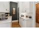 Charming kitchen with marble counters and custom cabinets at 150 Trinity Farm Dr, Canton, GA 30115