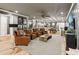 Spacious living room featuring a pool table, leather seating, and ample entertainment space at 150 Trinity Farm Dr, Canton, GA 30115